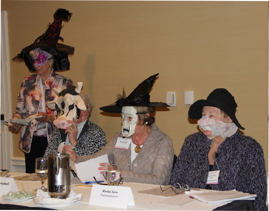 Lois Shuster, former NGC President, (standing) moderated the State Presidents’ panel reports